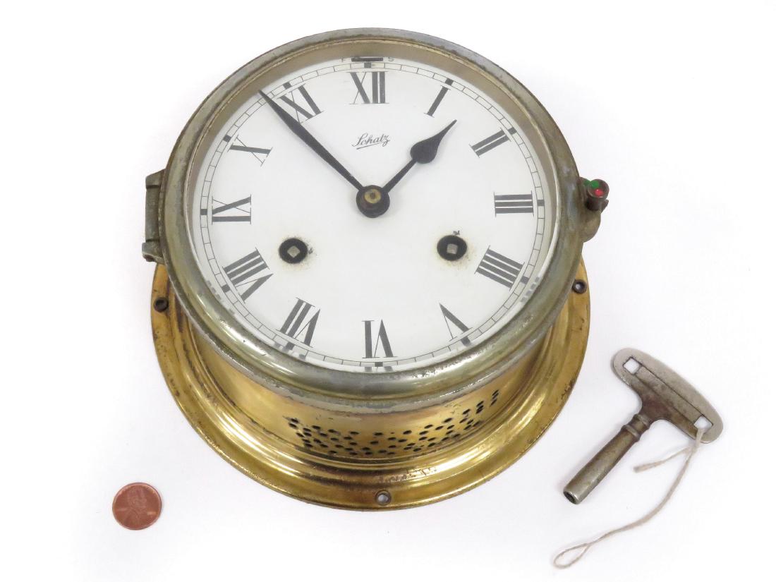 VINTAGE SCHATZ SHIP'S BELL CLOCK. DIAMETER 6 1/2"