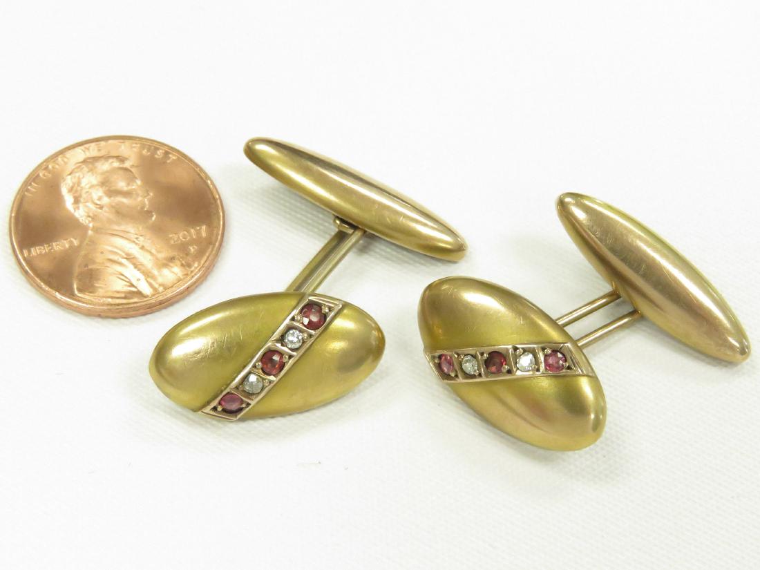 YELLOW GOLD (TESTS 14K) RUBY AND DIAMOND CUFF LINKS. (1 of 2)