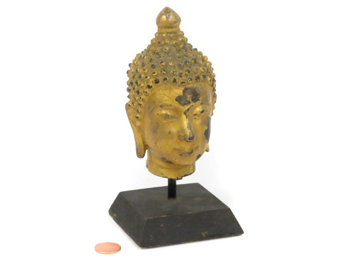 THAI GILT BRONZE HEAD OF BUDDHA. HEIGHT 5" WITH STAND (1 of 2)