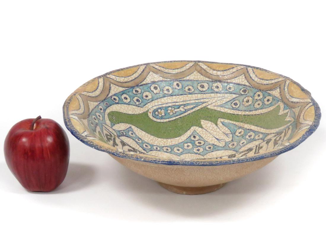 ISLAMIC DECORATED POTTERY BOWL WITH KUFIC SCRIPT.: ISLAMIC DECORATED POTTERY BOWL WITH KUFIC SCRIPT. HEIGHT 4"; DIAMETER 12 1/2"