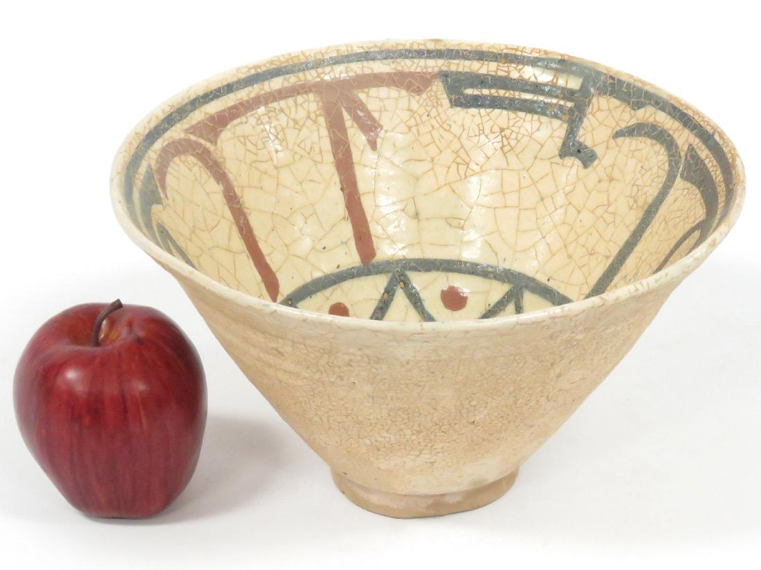 ISLAMIC DECORATED POTTERY BOWL WITH KUFIC SCRIPT.: ISLAMIC DECORATED POTTERY BOWL WITH KUFIC SCRIPT. HEIGHT 6"; DIAMETER 10"