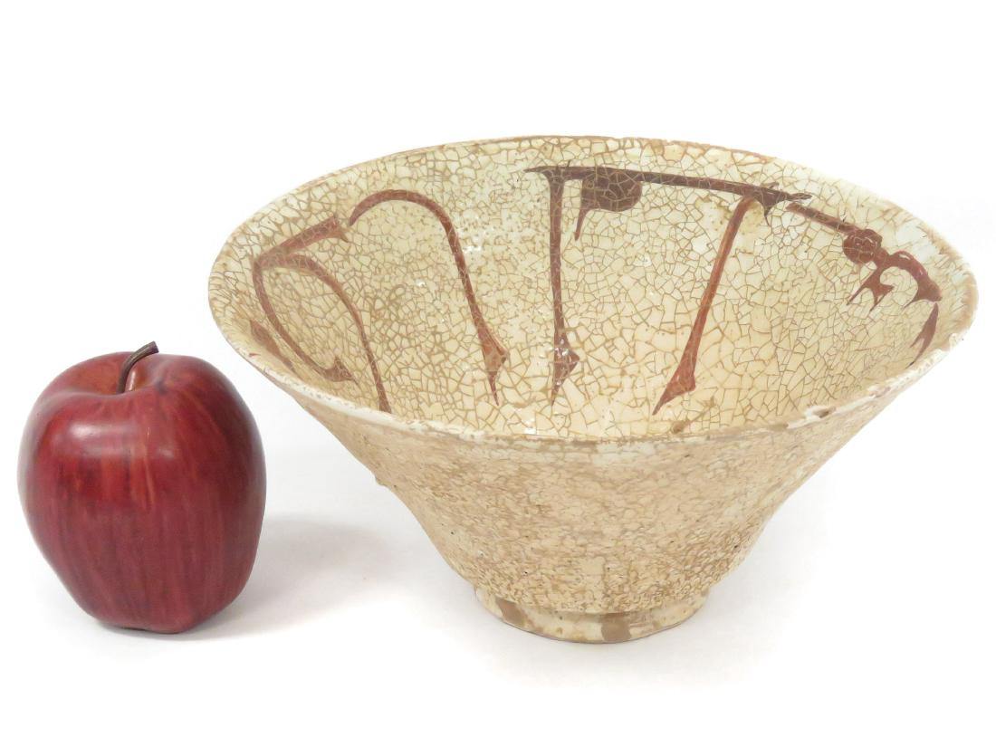 ISLAMIC DECORATED POTTERY BOWL WITH KUFIC SCRIPT.: ISLAMIC DECORATED POTTERY BOWL WITH KUFIC SCRIPT. HEIGHT 4 1/2"; DIAMETER 9 1/4"