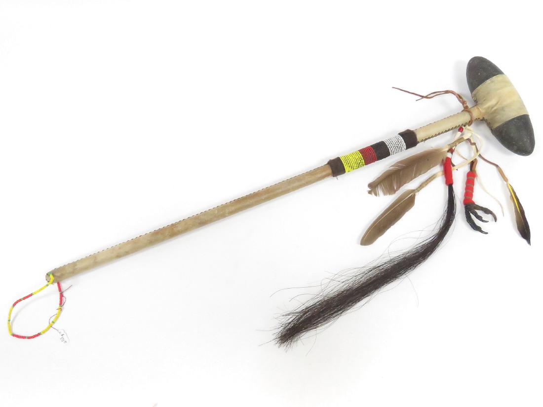 NATIVE AMERICAN (SIOUX) STONE WAR CLUB, 20TH CENTURY. (1 of 3)