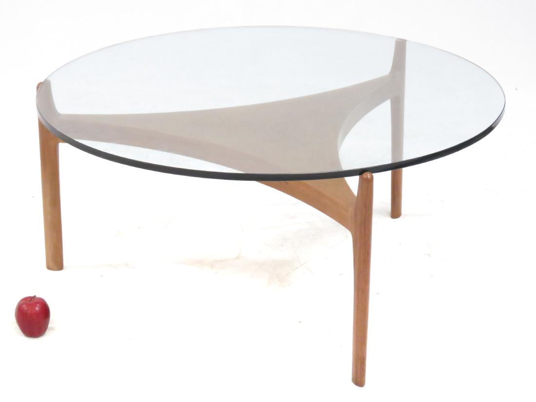 MID-CENTURY SCANDINAVIAN DESIGN TEAK AND PLATE-GLASS: MID-CENTURY SCANDINAVIAN DESIGN TEAK AND PLATE-GLASS COCKTAIL TABLE. HEIGHT 18"; DIAMETER 39"