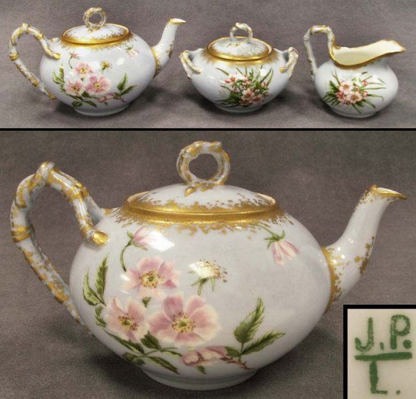 SET (3) JP&L LIMOGES DECORATED PORCELAIN TEAPOT: SET (3) JP&L LIMOGES DECORATED PORCELAIN TEAPOT, CREAMER AND SUGAR. TEAPOT; HEIGHT 4"; LENGTH 7"