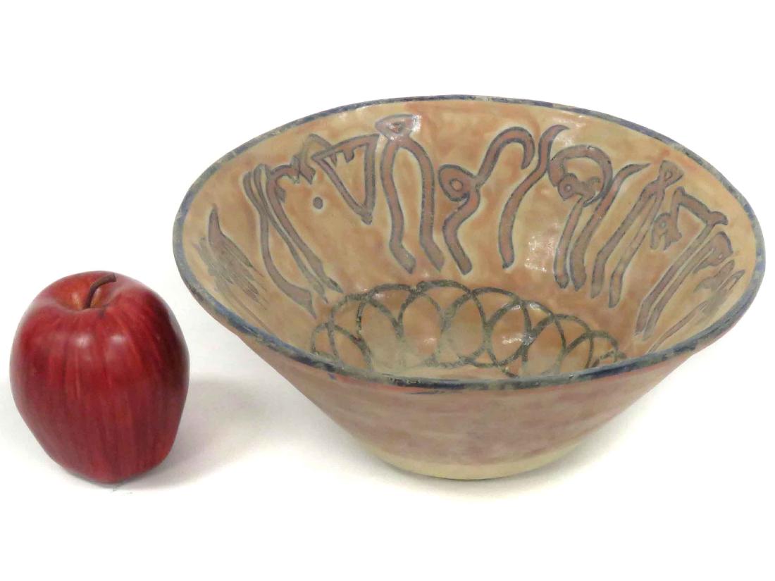 ISLAMIC DECORATED POTTERY BOWL WITH KUFIC SCRIPT.: ISLAMIC DECORATED POTTERY BOWL WITH KUFIC SCRIPT. HEIGHT 4"; DIAMETER 10"