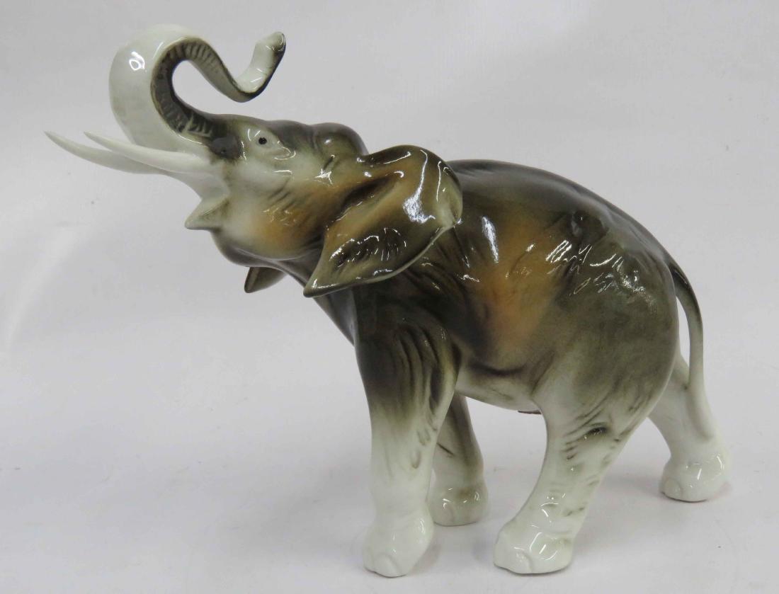ROYAL DUX PORCELAIN ELEPHANT. HEIGHT 8 1/4" (1 of 2)