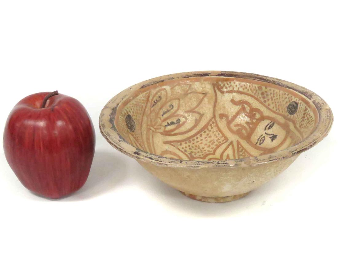 ISLAMIC DECORATED POTTERY BOWL WITH ANTHROPOMORPHIC: ISLAMIC DECORATED POTTERY BOWL WITH ANTHROPOMORPHIC FIGURE. HEIGHT 3"; DIAMETER 8"