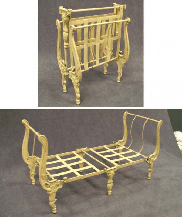 PAINTED CAST IRON DOLL'S FOLDING CAMPAIGN BED: PAINTED CAST IRON DOLL'S FOLDING CAMPAIGN BED, 19TH CENTURY. HEIGHT 11"; LENGTH 21 3/4" (SLIGHT PAINT LOSS AT HINGES)