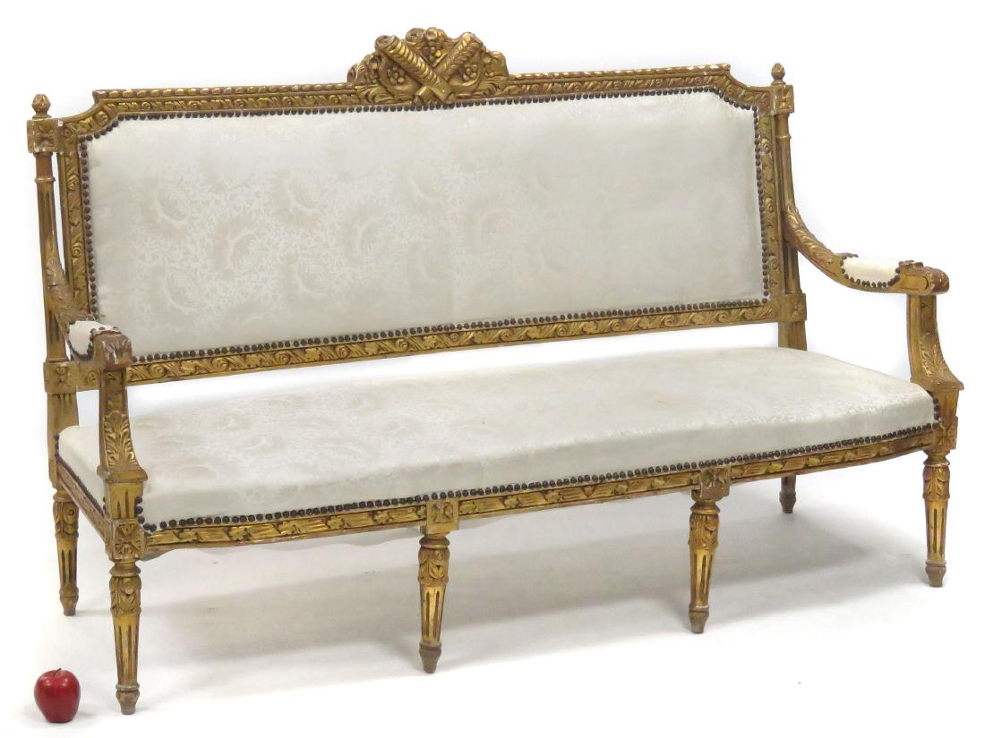 FRENCH STYLE CARVED AND GILT SOFA. HEIGHT 44"; LENGTH: FRENCH STYLE CARVED AND GILT SOFA. HEIGHT 44"; LENGTH 70"; DEPTH 26"