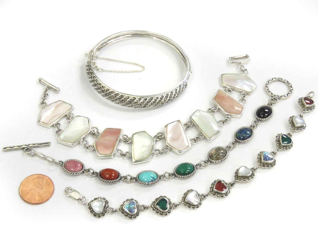 LOT (4) 925 STERLING BRACELETS INCLUDING MARCASITES,: LOT (4) 925 STERLING BRACELETS INCLUDING MARCASITES, MOTHER-OF-PEARL & ASSORTED GEM STONES. LENGTH 7-8"; GROSS WEIGHT 94.83 GRAMS