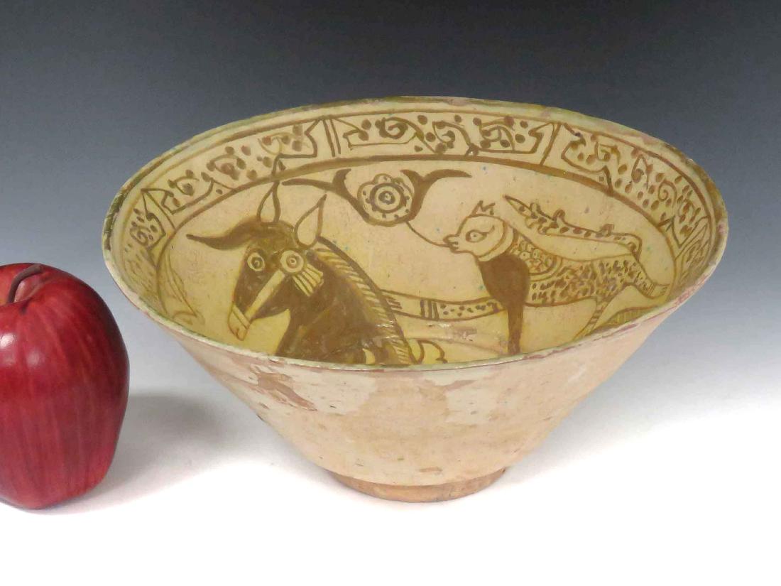 ISLAMIC DECORATED POTTERY BOWL WITH ANIMALS. HEIGHT 4"; (1 of 4)