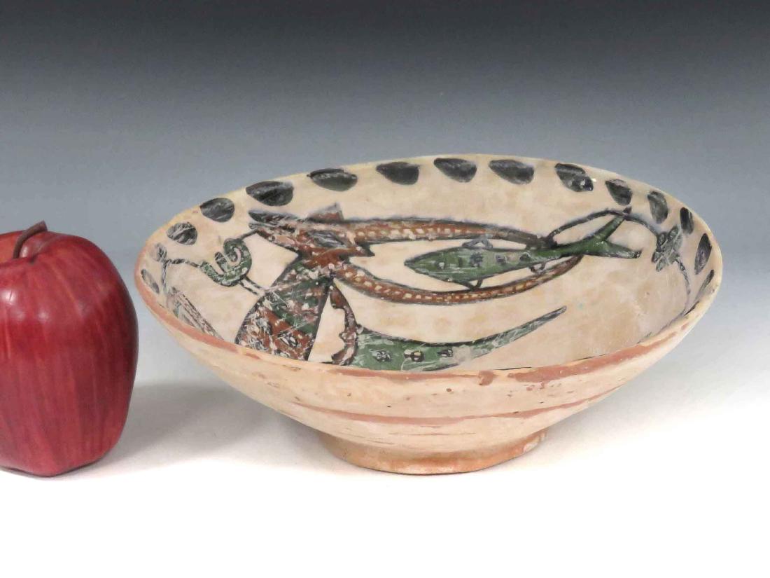ISLAMIC DECORATED POTTERY BOWL WITH DEER. HEIGHT 3";: ISLAMIC DECORATED POTTERY BOWL WITH DEER. HEIGHT 3"; DIAMETER 8 1/2"