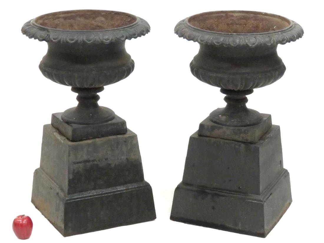 PAIR VINTAGE CAST IRON PLANTERS ON BASES. HEIGHT 31" (1 of 2)