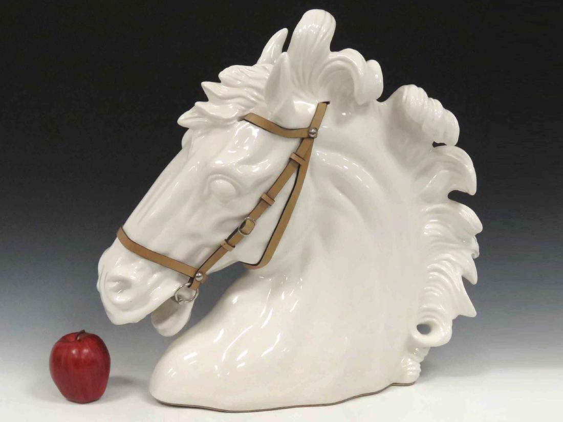 GUCCI, WHITE PORCELAIN HORSE HEAD WITH LEATHER BRIDLE, (1 of 2)