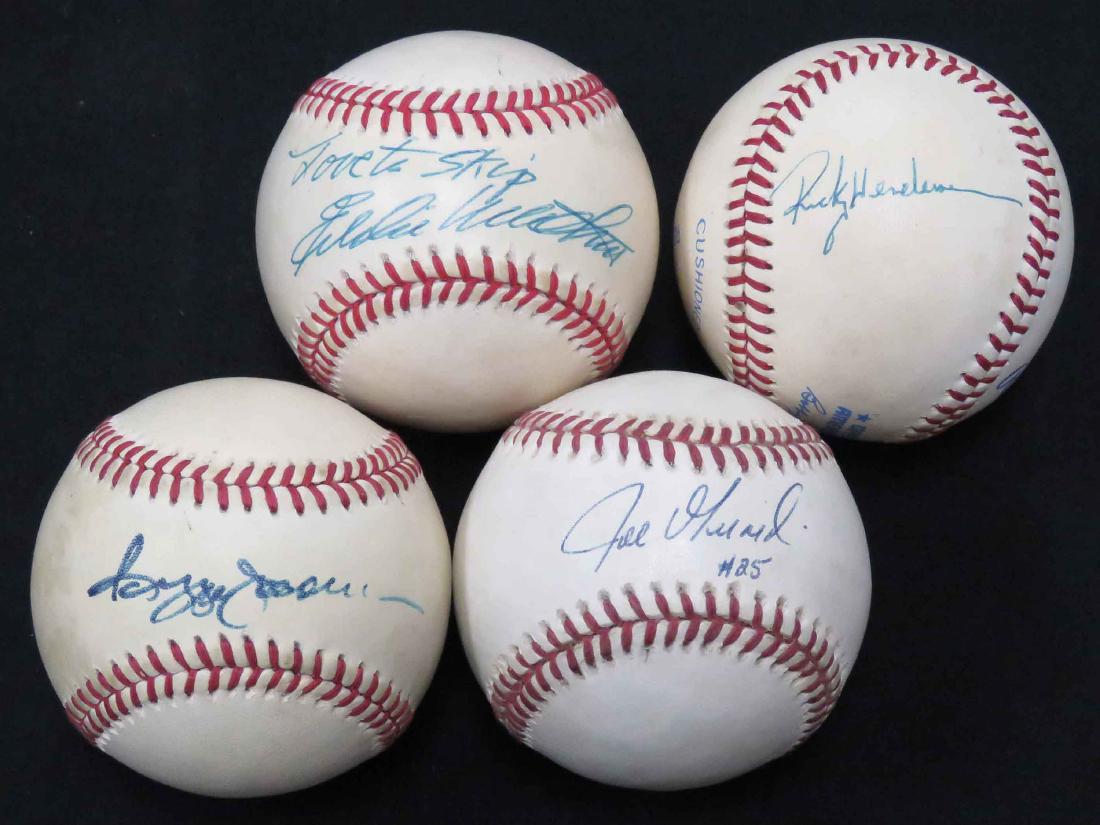 LOT (4) AUTOGRAPHED (SINGLE SIGNED) BASEBALLS INCLUDING: LOT (4) AUTOGRAPHED (SINGLE SIGNED) BASEBALLS INCLUDING REGGIE JACKSON, JOE GERADI, RICKEY HENDERSON AND EDDIE MATTHEWS***Please note that none of the signatures have been vetted and carry no COA unle