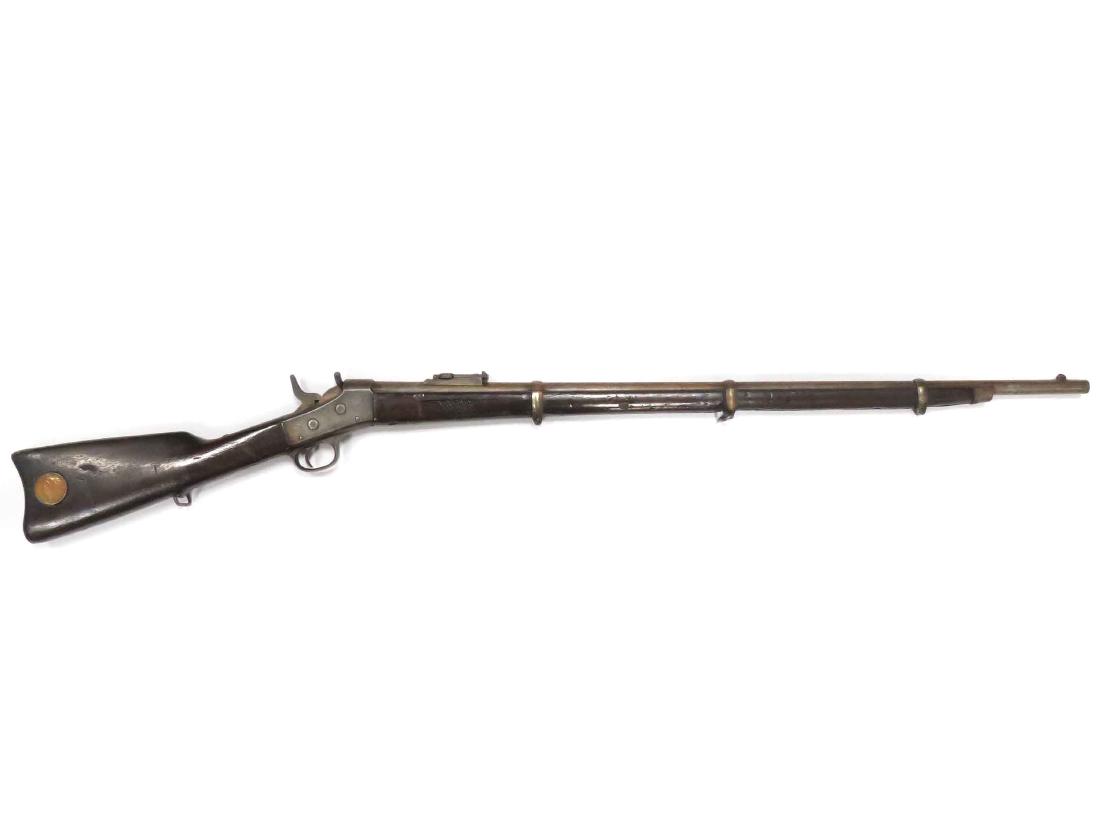 REMINGTON .50 CAL ROLLING BLOCK MILITARY RIFLE, #611,: REMINGTON .50 CAL ROLLING BLOCK MILITARY RIFLE, #611, 1874 BL 34" (LIKELY INDIAN WARS WITH 1880 INSET SILVER DOLLAR IN STOCK & CARVING ON FORESTOCK, MISSING CLEANING ROD)