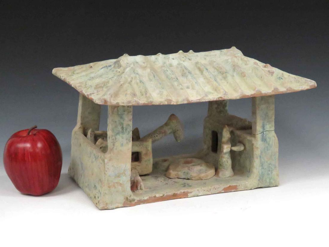 CHINESE IRIDESCENT GREEN GLAZED TERRA COTTA MODEL OF A (1 of 3)