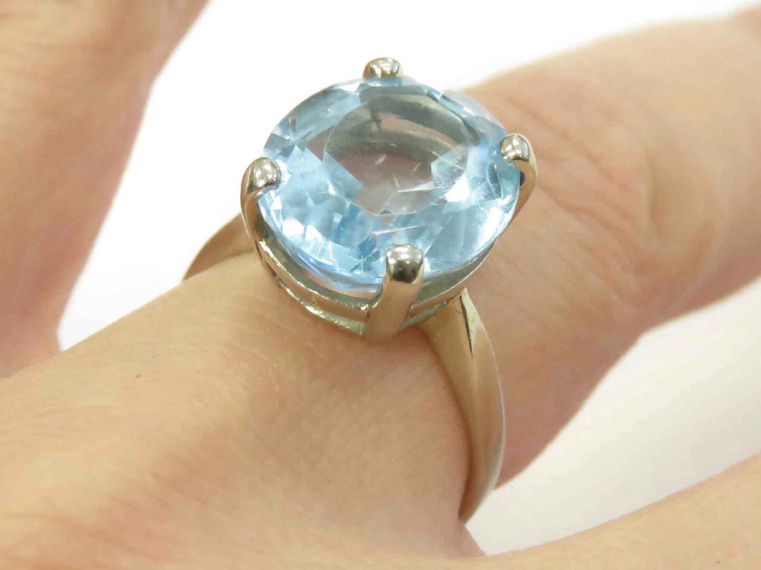 WHITE GOLD (TESTS 14K) OVAL-CUT 0.69 CT BLUE TOPAZ (1 of 2)