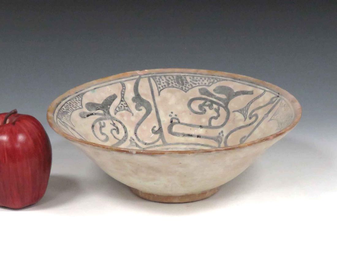ISLAMIC DECORATED POTTERY BOWL WITH SCRIPT. HEIGHT 3: ISLAMIC DECORATED POTTERY BOWL WITH SCRIPT. HEIGHT 3 1/4"; DIAMETER 9 1/2"