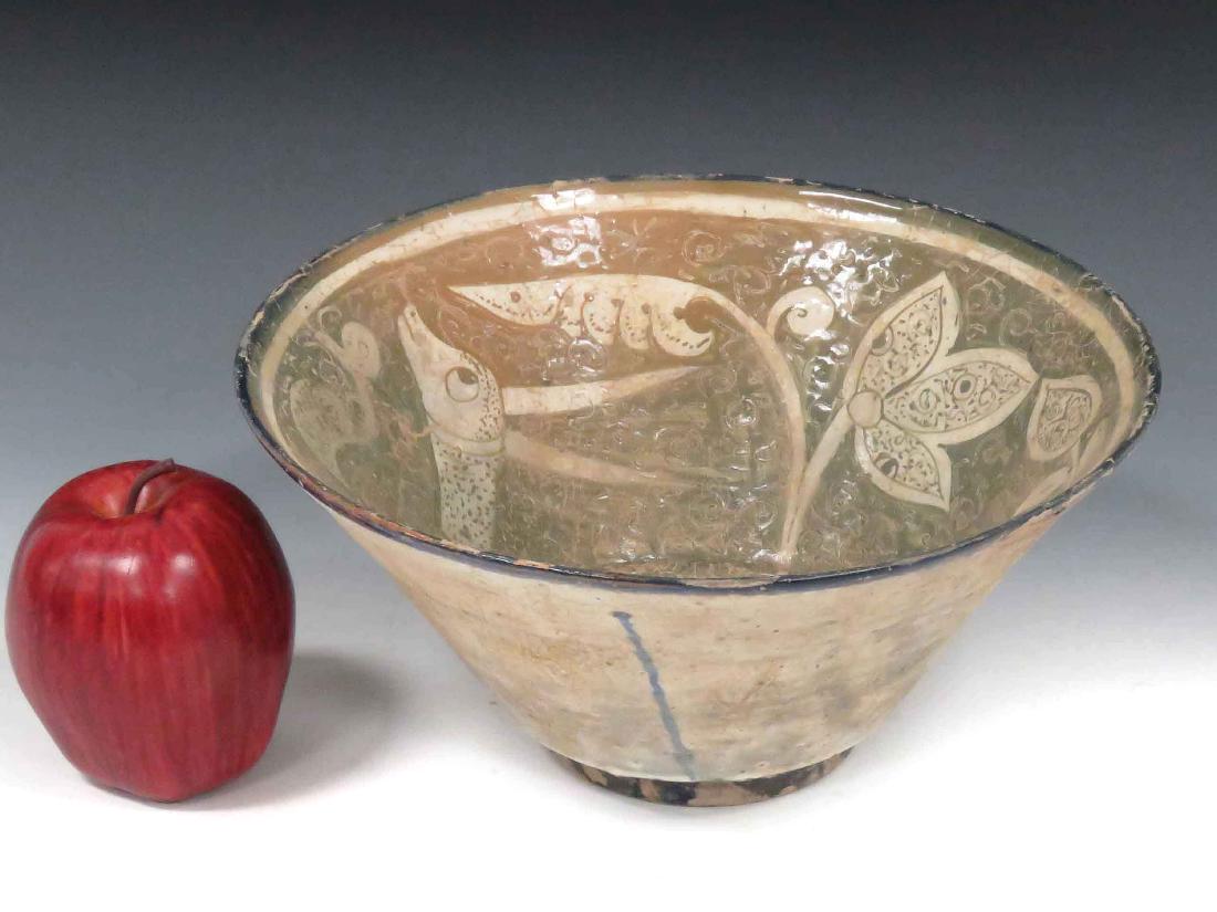 ISLAMIC DECORATED POTTERY BOWL WITH DEER. HEIGHT 4 1/4";: ISLAMIC DECORATED POTTERY BOWL WITH DEER. HEIGHT 4 1/4"; DIAMETER 9 3/4"