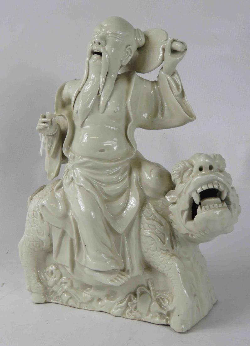 CHINESE BLANC DE CHINE PORCELAIN FIGURE, LOHAN UPON A (1 of 1)