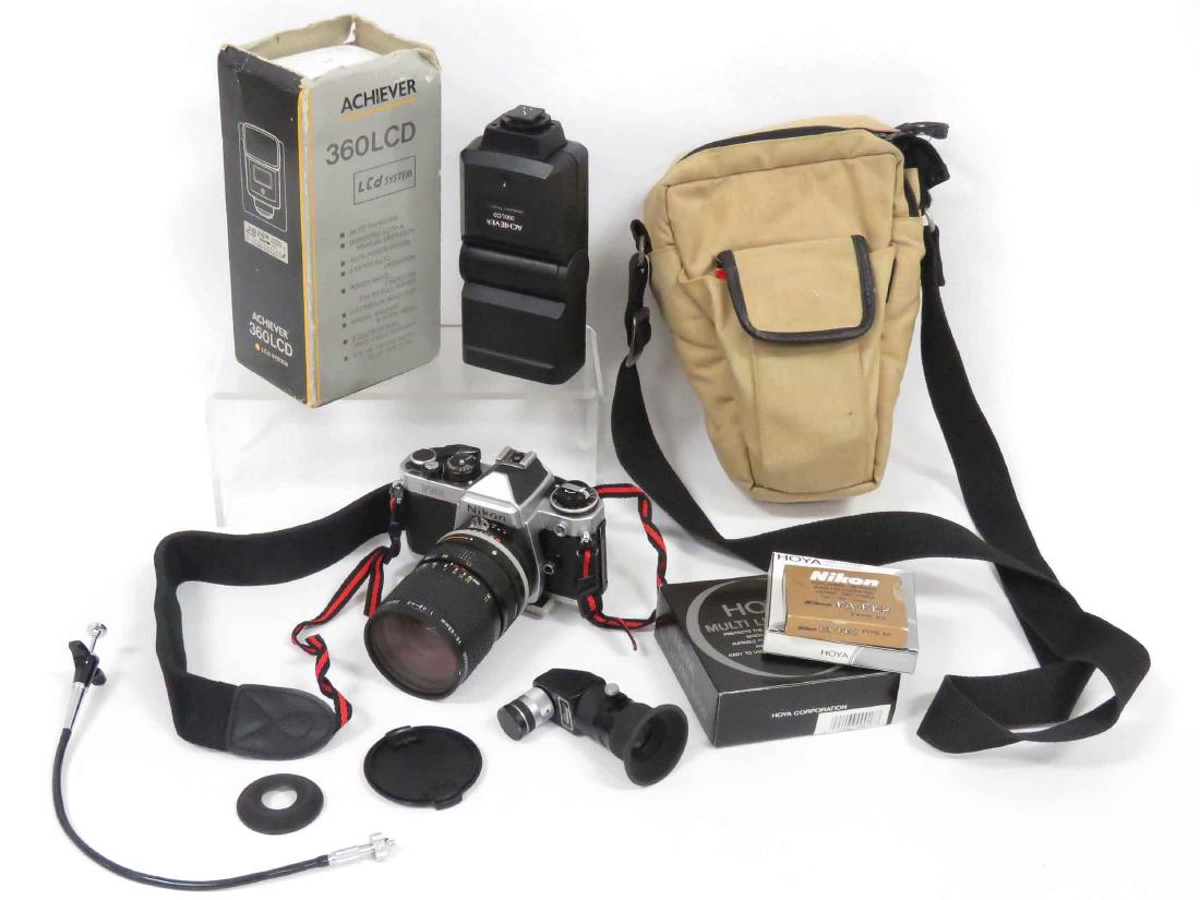 NIXON FE2 35MM CAMERA WITH NIKKOR 26-85MM TELEPHOTO (1 of 2)