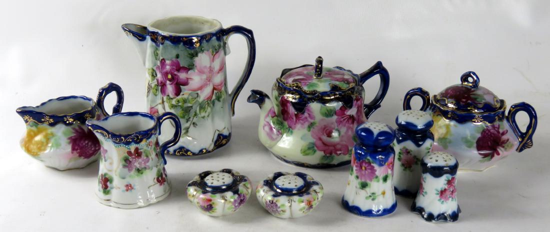 LOT ASSORTED NIPPON DECORATED PORCELAIN INCLUDING: LOT ASSORTED NIPPON DECORATED PORCELAIN INCLUDING TEAPOT, CREAMERS, SALT & PEPPER