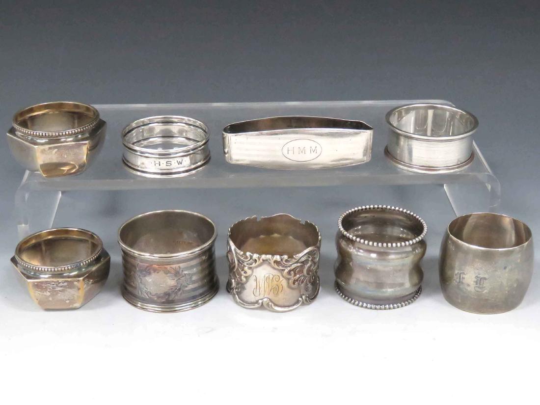 ASSORTED LOT STERLING INCLUDING (7) NAPKIN RINGS & (2): ASSORTED LOT STERLING INCLUDING (7) NAPKIN RINGS & (2) OPEN SALTS (MISSING LINERS). TWT 6.91 OZT