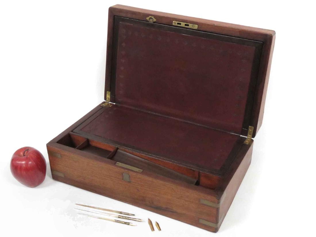 MAHOGANY WRITING/LAPDESK WITH BRASS FITTINGS, 19TH: MAHOGANY WRITING/LAPDESK WITH BRASS FITTINGS, 19TH CENTURY. HEIGHT 5 1/2"; WIDTH 15 1/2" (MISSING INK WELLS & SUPPORT IN PEN HOLDER)