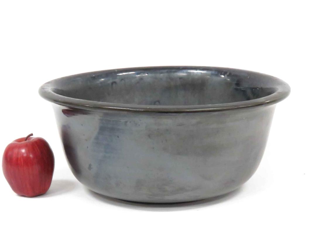 HALL POTTERY IRIDESCENT GLAZE OVERSIZED IRONSTONE BOWL.: HALL POTTERY IRIDESCENT GLAZE OVERSIZED IRONSTONE BOWL. HEIGHT 6 1/4"; DIAMETER 14 1/4";