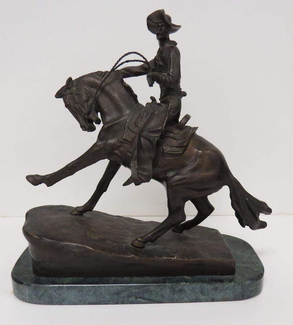 AFTER FREDERIC REMINGTON, BRONZE COWBOY, SIGNED. HEIGHT: AFTER FREDERIC REMINGTON, BRONZE COWBOY, SIGNED. HEIGHT 10"; LENGTH 9 1/2"