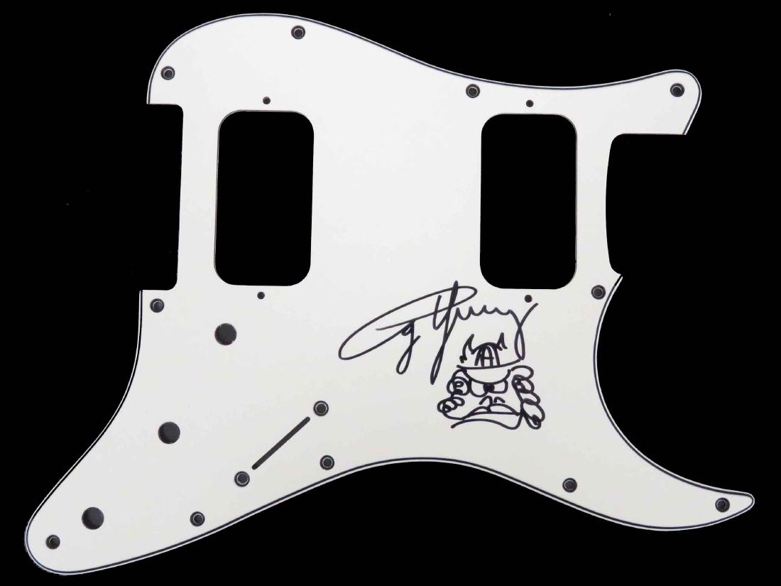 ANGUS YOUNG (AUSTRALIAN ROCKER FOUNDING MEMBER AC/DC: ANGUS YOUNG (AUSTRALIAN ROCKER FOUNDING MEMBER AC/DC 1955-), AUTOGRAPHED GUITAR SCRATCH PLATE. 8 1/2 X 11"