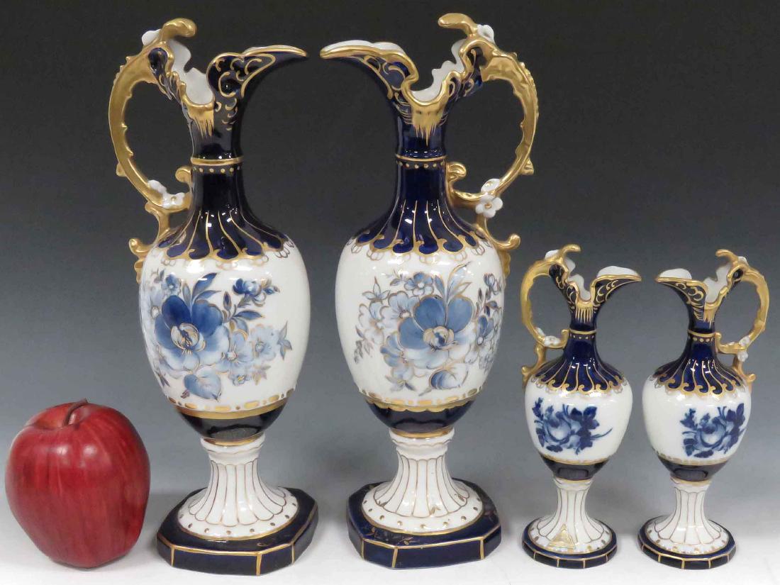 LOT (4) ROYAL DUX DECORATED PORCELAIN EWER GARNITURES.: LOT (4) ROYAL DUX DECORATED PORCELAIN EWER GARNITURES. HEIGHT 7-11 1/2" (1/IMPERFECT)
