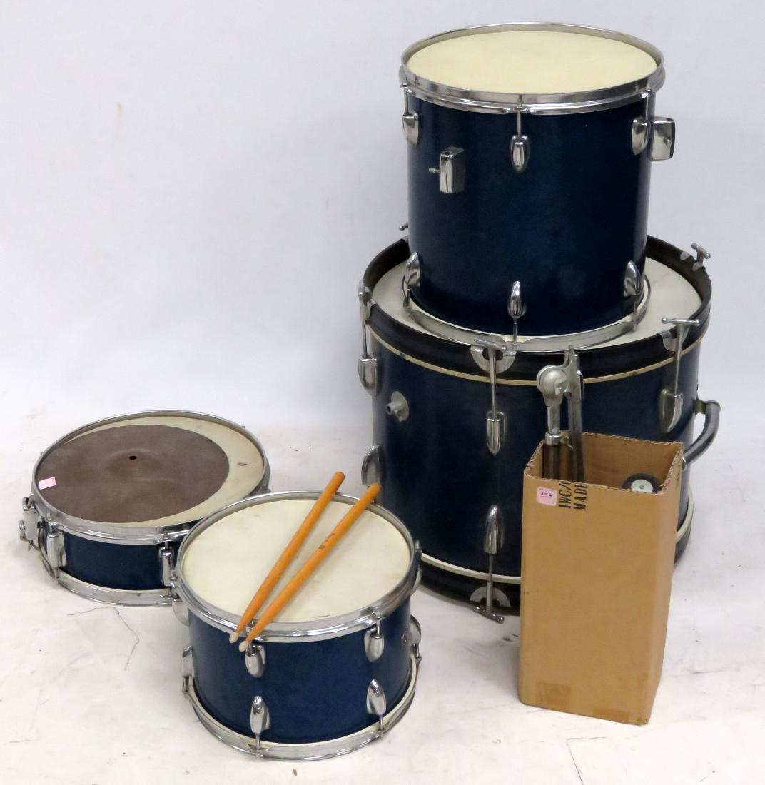 BLUE METAL FLAKE DRUM SET: BLUE METAL FLAKE DRUM SET. (There is no apparent branding, just Made in Japan; smallest to largest: height 6", dia. 14 1/2"; 9"-12 1/2"; 13 1/2-14 1/2"; 17 1/2-20 1/2". )