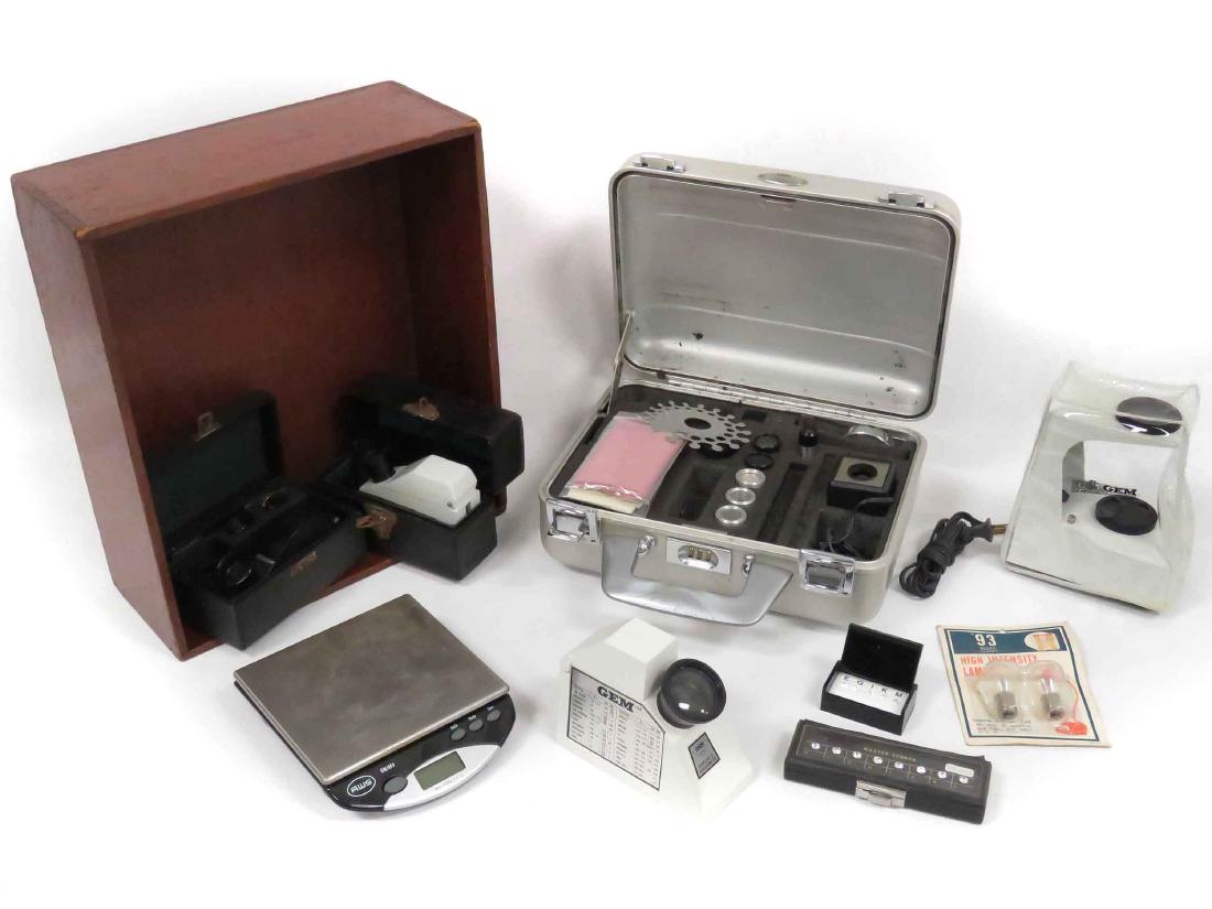 LOT GEMOLOGICAL EQUIPMENT INCLUDING (3) REFRACTOMETERS: LOT GEMOLOGICAL EQUIPMENT INCLUDING (3) REFRACTOMETERS INCLUDING GIA; GIA POLARSEGE MOD 415; GIA CARRY CASE; AWS SCALE; (2) CZ/DIAMOND MASTER STONE SETS; LEVERAGE GAUGES; ETC.
