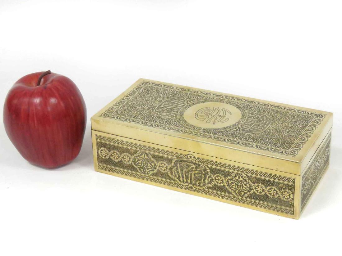 MAUSER/FIFTH AVE. NY BRASS ISLAMIC ENGRAVED CIGARETTE: MAUSER/FIFTH AVE. NY BRASS ISLAMIC ENGRAVED CIGARETTE BOX, LINED. HEIGHT 2 3/4"; TOP 4 X 8" (MISSING DIVIDER)