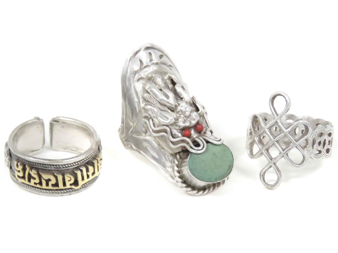 LOT (3) CHINESE SILVER RINGS INCLUDING DRAGON, MONKEY &: LOT (3) CHINESE SILVER RINGS INCLUDING DRAGON, MONKEY & BUDDHIST. APPROXIMATELY 7 1/2"