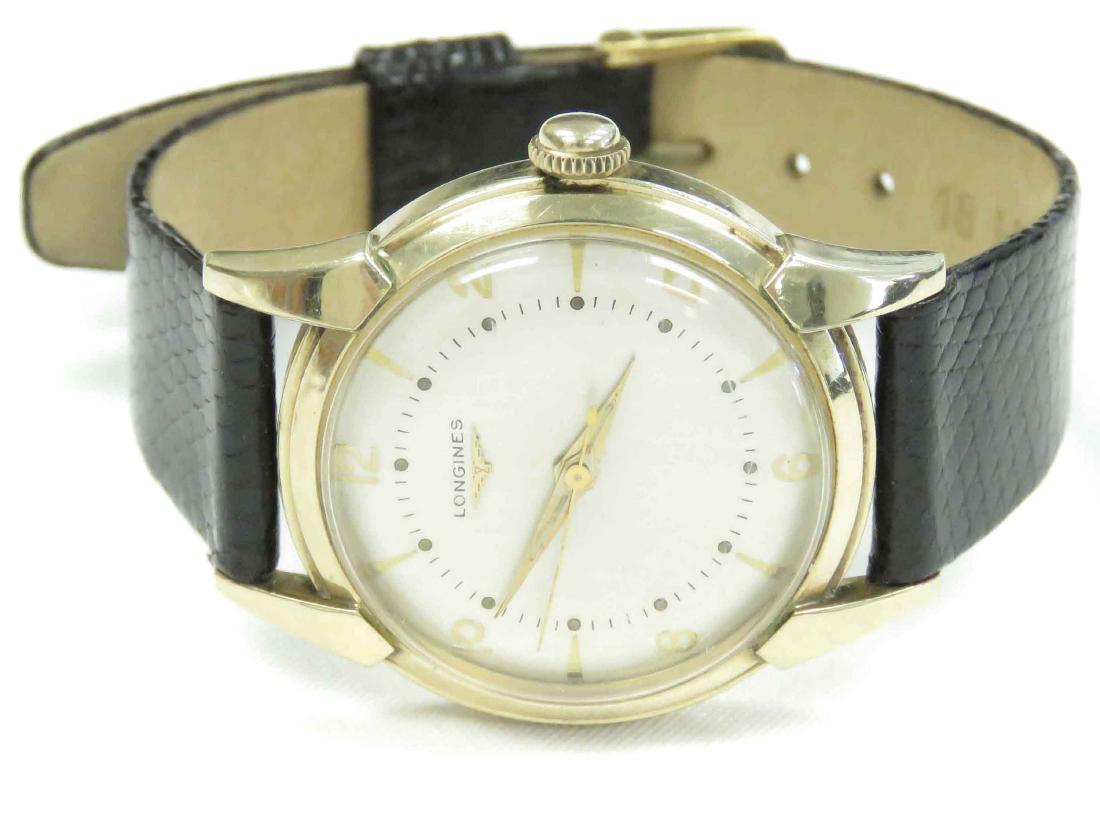 VINTAGE LONGINES GOLD FILLED 17-JEWEL MECHANICAL: VINTAGE LONGINES GOLD FILLED 17-JEWEL MECHANICAL WRISTWATCH, TRIPLE SIGNED. 34MM
