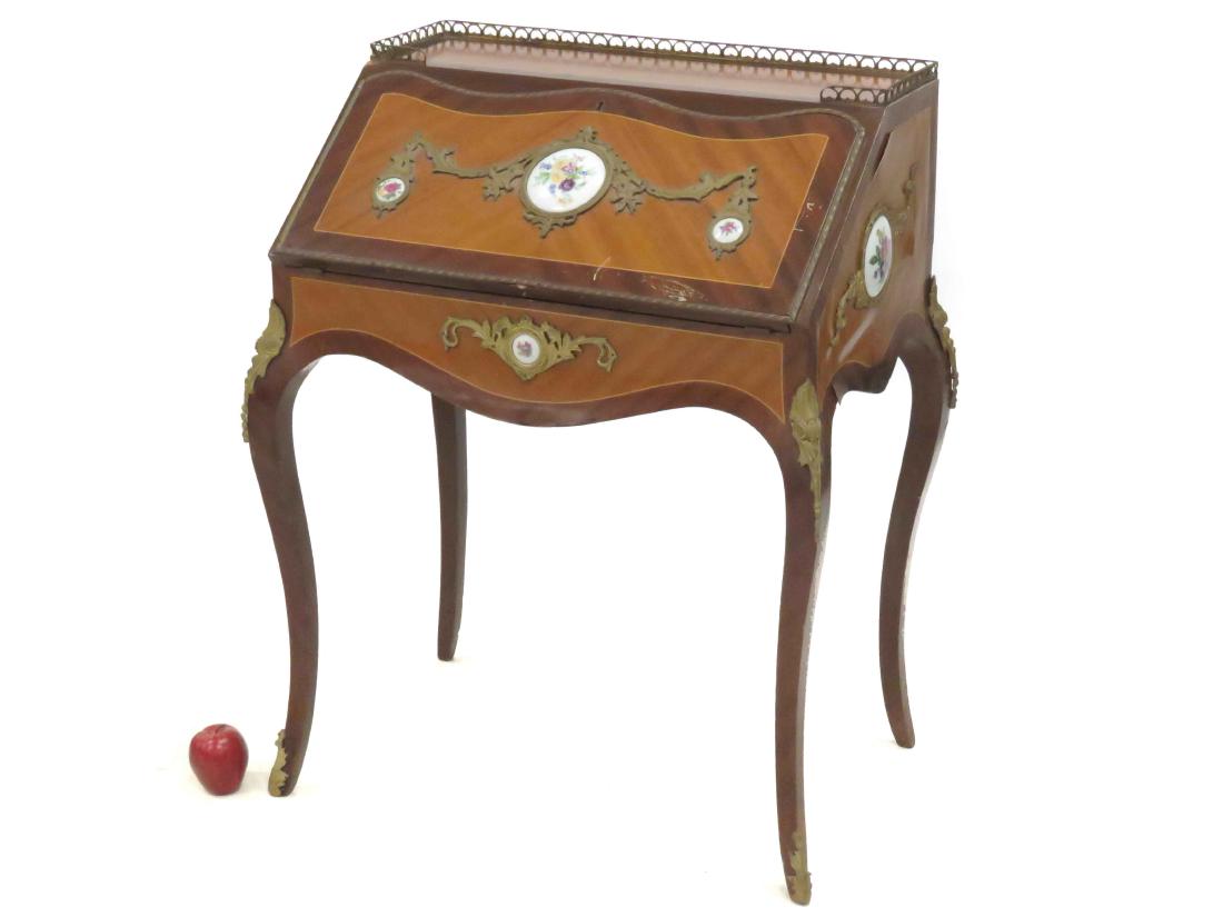 FRENCH LOUIS XV STYLE CARVED/INLAID MAHOGANY SLANT: FRENCH LOUIS XV STYLE CARVED/INLAID MAHOGANY SLANT FRONT DESK WITH ORMOLU AND PORCELAIN MOUNTS. HEIGHT 38"; WIDTH 28"
