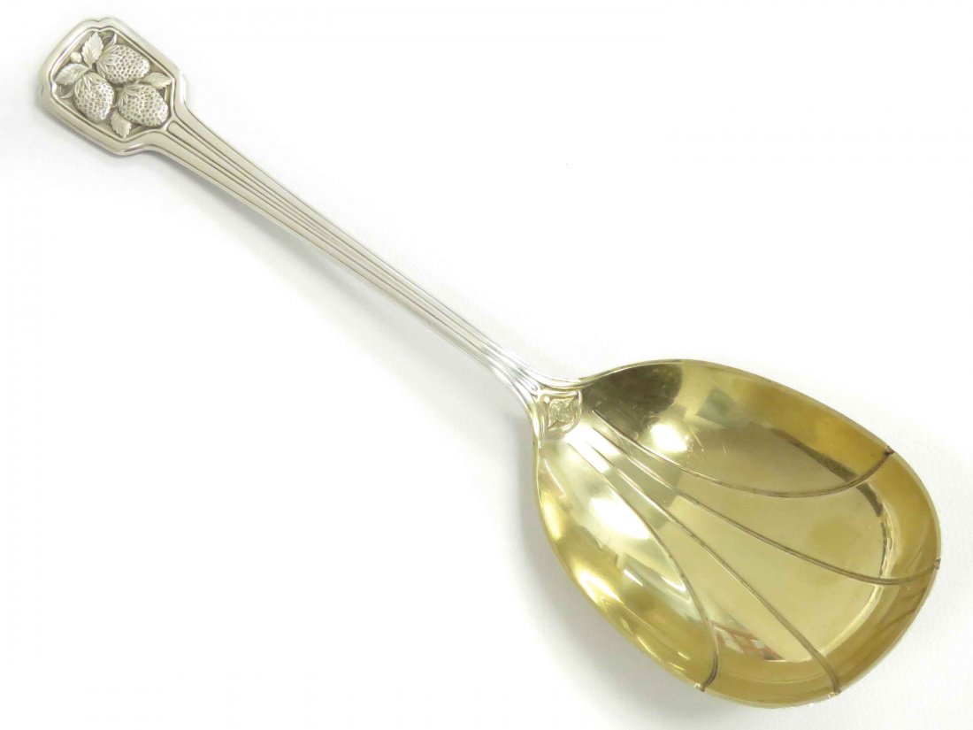 TIFFANY & CO STERLING "STRAWBERRY" GILT BOWL BERRY: TIFFANY & CO STERLING "STRAWBERRY" GILT BOWL BERRY SPOON, MONOGRAMMED, MOORE MARK. LENGTH 9 1/4"; 4.06 OZT (ESTIMATE $300-$400)