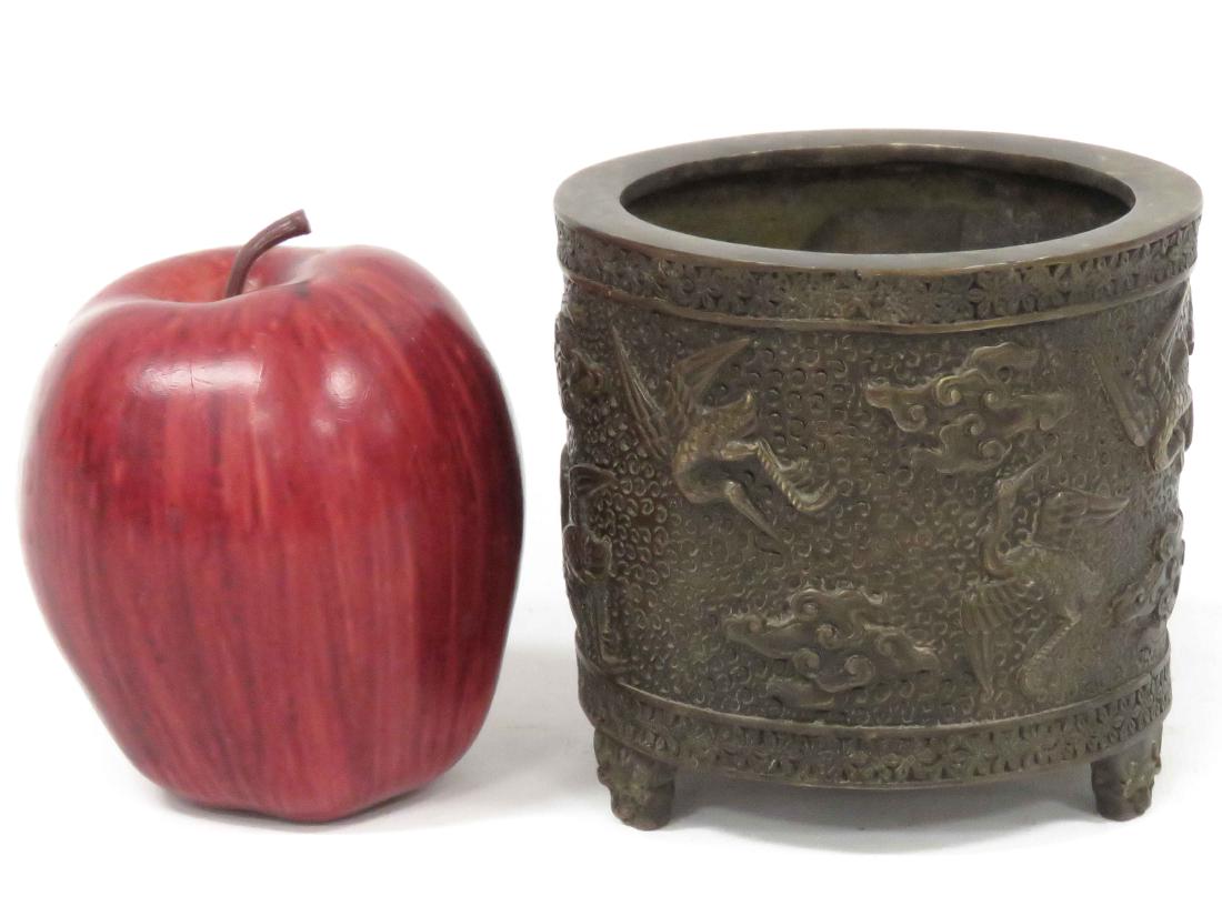 CHINESE BRONZE TRI-FOOT CENSER, BEARING REIGN MARK.: CHINESE BRONZE TRI-FOOT CENSER, BEARING REIGN MARK. HEIGHT 3 1/2"; DIAMETER 3 7/8"