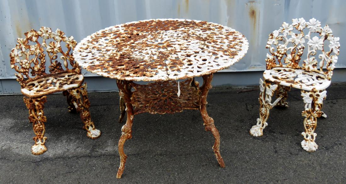 VINTAGE CAST IRON TABLE WITH (2) CHAIRS. HEIGHT 26 1/2"; (1 of 1)