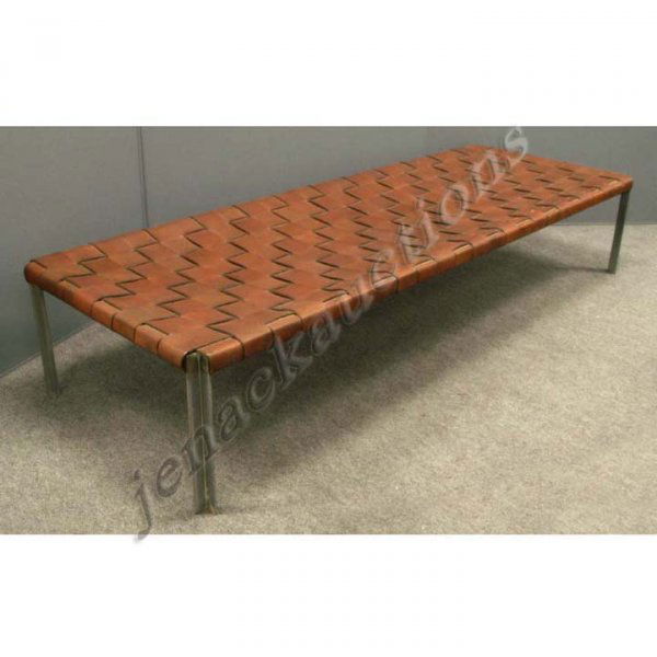 CUSTOM MADE ESTELLE AND IRWIN LAVERNE BENCH: CUSTOM MADE ESTELLE AND IRWIN LAVERNE STAINLESS/WOVEN LEATHER LOW BENCH. HEIGHT 14 1/2"; LENGTH 76" **DUE TO THE SIZE AND/OR FRAGILITY OF THIS LOT IN HOUSE SHIPPING IS NOT AVAILABLE; A ROSTER OF SHIPP