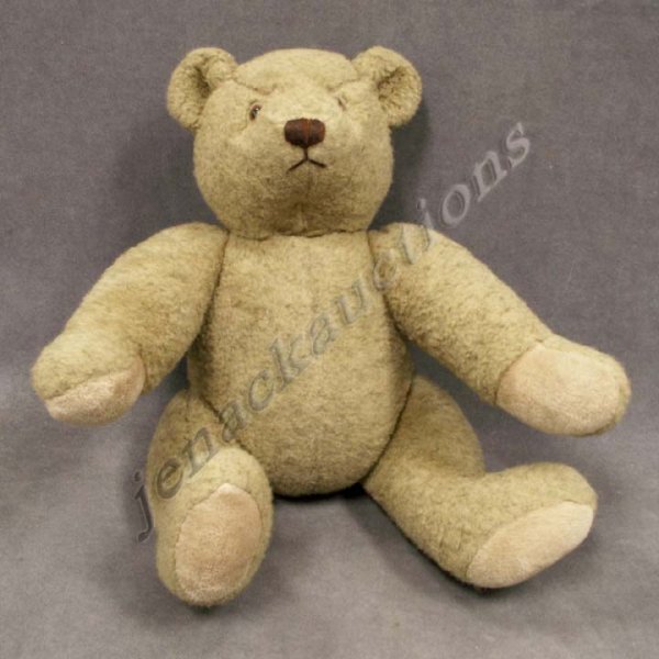 JOINTED TEDDY BEAR WITH GLASS EYES
