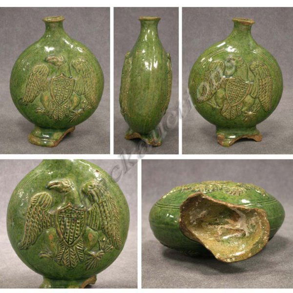 RARE AND POSSIBLY UNIQUE MORAVIAN POTTERY FLASK: RARE AND POSSIBLY UNIQUE MORAVIAN MOLDED POTTERY FLASK WITH AMERICAN EAGLE AND SHIELD CREST. 19TH CENTURY HEIGHT 5 1/2" (NOTE; NO EXAMPLES OF THIS TYPE ARE KNOWN. SIMILAR EAGLE MOLDED DESIGN DOCUMENTE