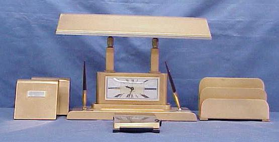 SILVERCREST BRONZE EXECUTIVE DESK SET: ART DECO SILVERCREST BRONZE EXECUTIVE DESK SET INCLUDING LIGHTED (SHEAFFER) PEN STAND WITH CLOCK/PENS LETTER STAND, PAIR BOOKENDS, LIST FINDER DIRECTORY, C1830'S