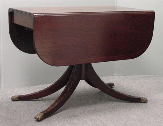 DUNCAN PHYFE STYLE DINING TABLE: DUNCAN PHYFE STYLE CARVED/INLAID MAHOGANY SPLIT CENTER DINING TABLE WITH (2) 15" LEAVES, C1940HEIGHT 29 1/2"; WIDTH 40" **NO IN-HOUSE SHIPPING**