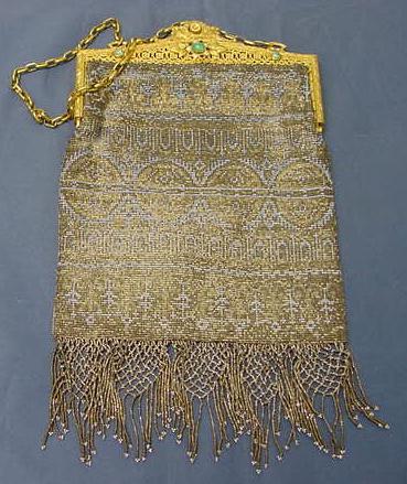 VINTAGE STEEL BEADED HAND BAG: VINTAGE STEEL BEADED HAND BAG WITH HIGH GILT ENAMELED & JEWELED FRAME & CHAIN HANDLE (LINING IMPERFECT). 7 1/2 X 5 1/2"