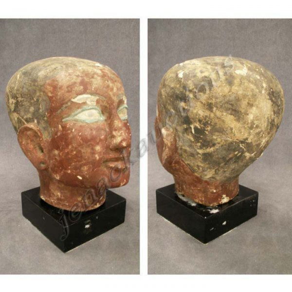 EGYPTIAN CARTONAGE AND WOOD HEAD OF A SCRIBE: EGYPTIAN CARTONAGE AND WOOD HEAD OF A SCRIBE/OFFICIAL, 26TH DYNASTY. HEIGHT 9" (EAR LOBES MAY HAVE BEEN REPAIRED AT A LATER DATE)